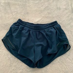 Blue athletic shorts.